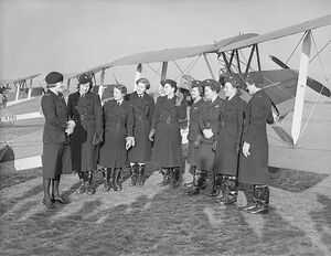 Women of the Air Transport Auxiliary at the Start of World War II: the First Eight in front of a brand new De Havilland Tiger Moth (leader [[Gower-344|Pauline Gower on the left). The other pilots are (left to right): [[Harrisson-102|Winifred Harrisson]], 